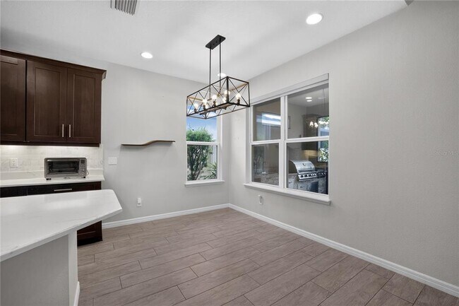 Building Photo - 8016 Marbella Crk Ave