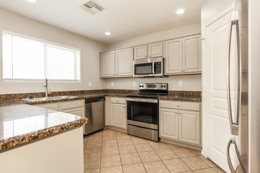 Building Photo - 24236 W Lasso Ln