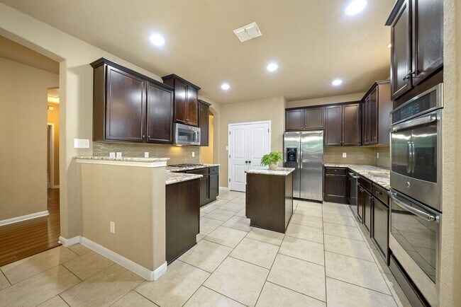 Building Photo - Executive-Style Home Now Available in Alam...