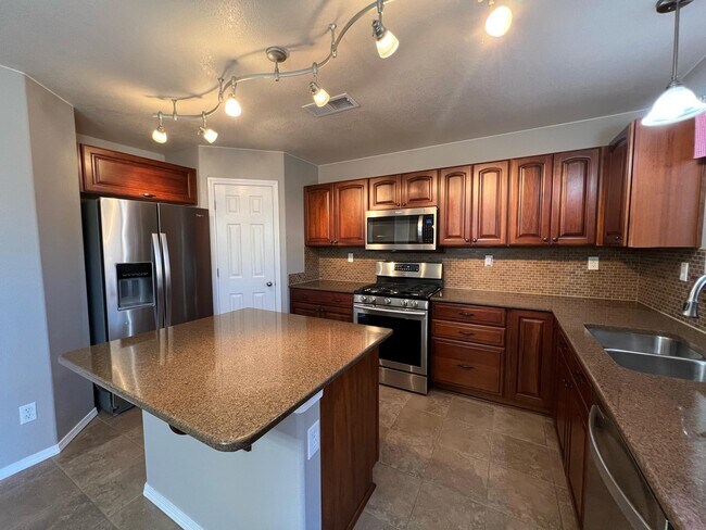 Building Photo - 10504 Woodquail Dr NW