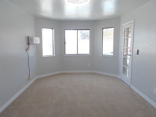 Building Photo - Stylishly Updated Single-Story 4BD Home with Sparkling Pool & Covered Patio Retreat