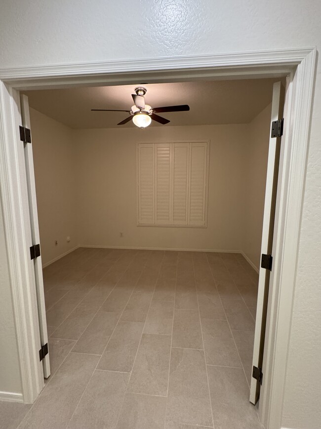 Large den with doors can be used as bedroom - 3339 E Comstock Dr