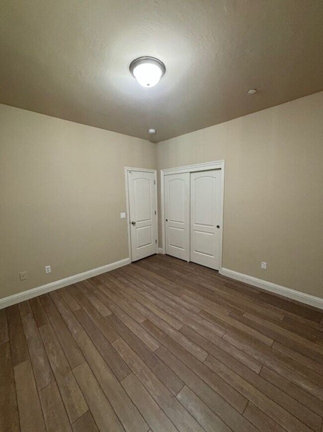 Building Photo - Elegant 4-Bedroom Home with Paid Solar in Gated Village Green Community