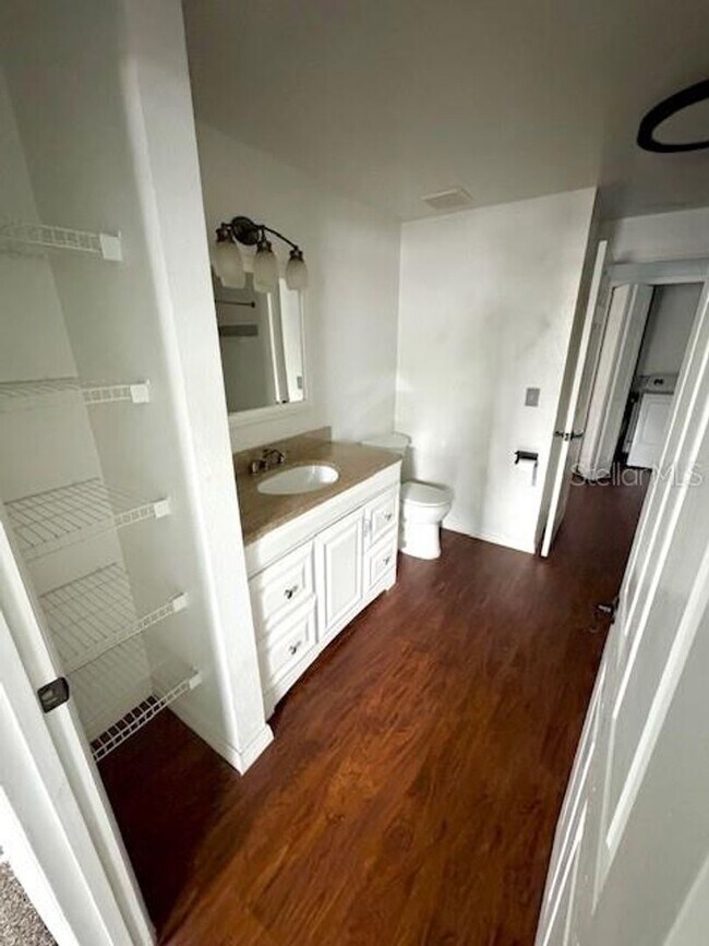 Building Photo - AVAILABLE NOW: First-floor 2-bedroom, 1-bath condo in Gated Community