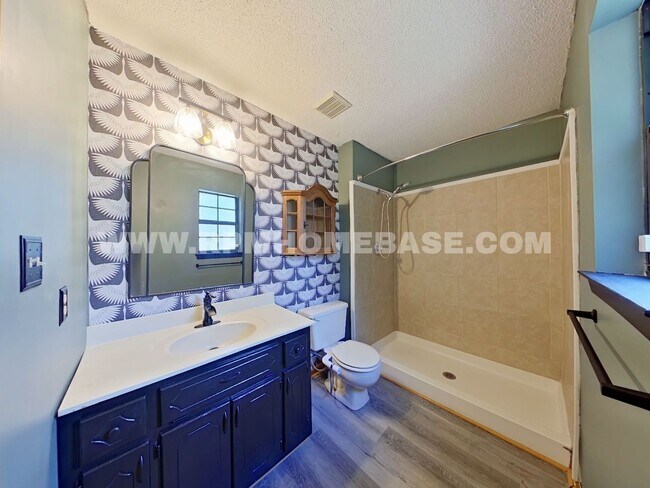 Building Photo - Charming 3-Bedroom Corner Lot Home with Sp...