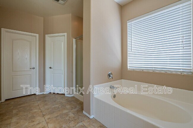 Building Photo - 44299 W Oster Dr