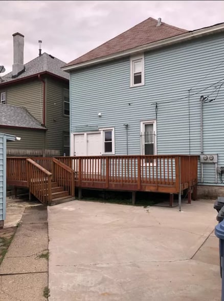 Back Exterior (shared deck + parking space for Unit 2) - 3454 Nicollet Ave