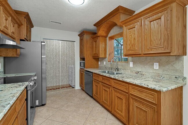 Building Photo - 9810 Kiwi Ln