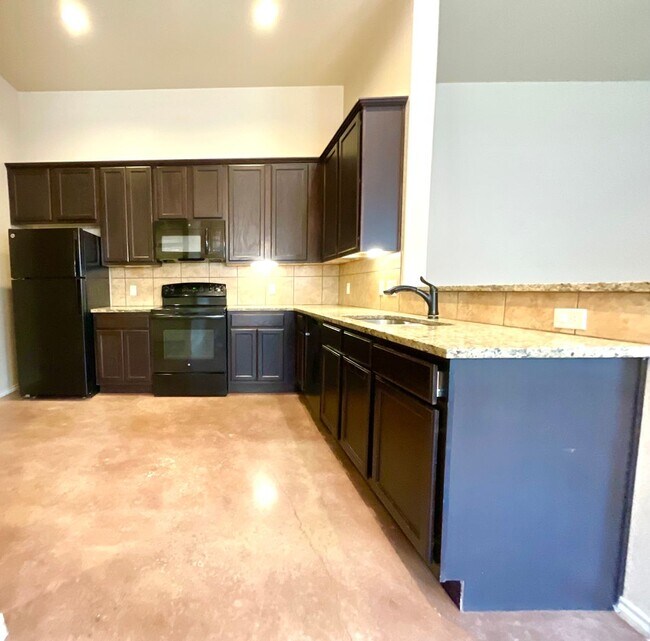 Building Photo - High Ceilings, Fenced Yard & 2-Car Garage – New Braunfels Living!