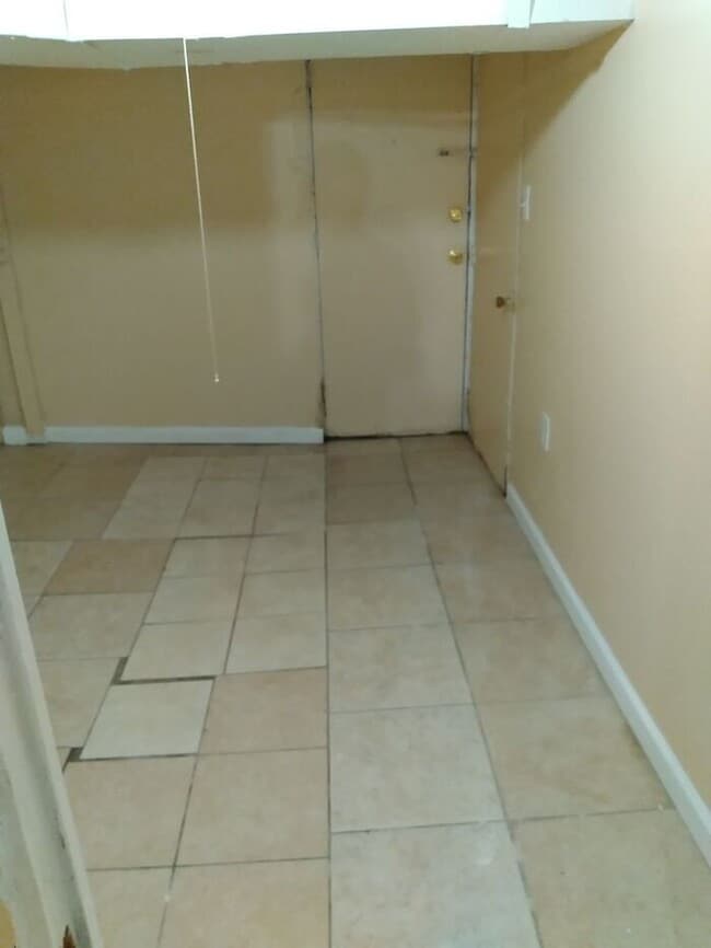 Building Photo - 3 bedrooms on the 3rd Floor with Central Hot Air, and an Available backyard