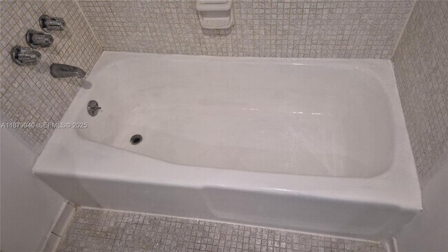 Building Photo - 19390 Collins Ave