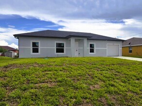 Building Photo - BRAND NEW CONSTRUCTION-3/2/1-MOVE IN READY