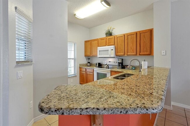 Building Photo - 8591 Bay Lilly Loop