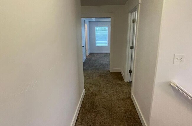 Building Photo - Spacious 4-Bedroom Home with Finished Basement in Taylorsville