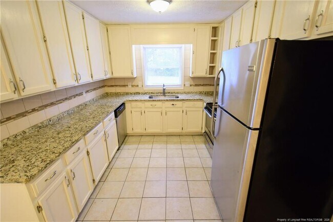 Building Photo - 6604 Bonnie Bell Ln