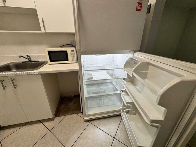 Building Photo - 6195 W 18th Ave