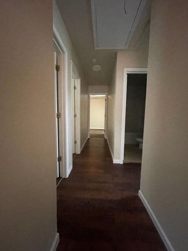 Building Photo - Must see this 4 bedroom 2.5 bath townhouse with 1 car garage .