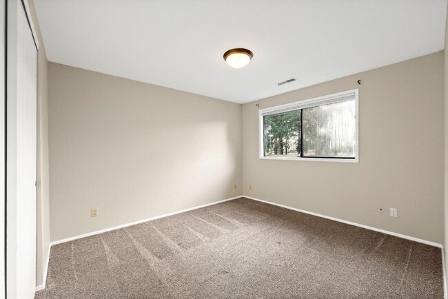 Building Photo - Light & Airy 2-Bedroom Tumwater Apartment with Pool, Covered Parking & Full-Size W/D