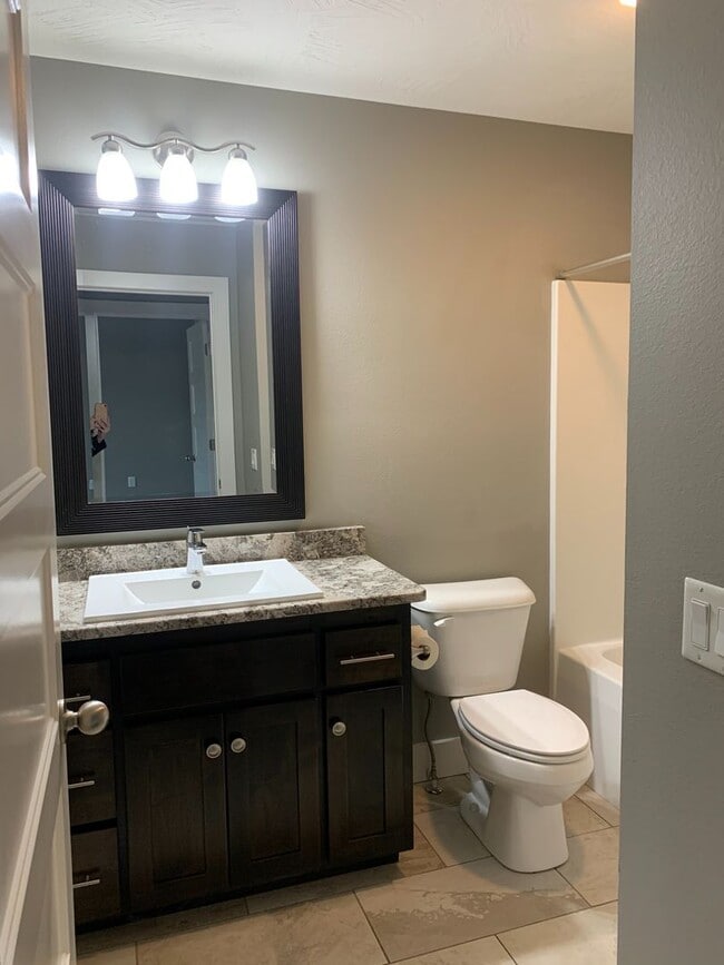 Building Photo - Beautiful Open Layout 3 Bedroom 2 Bath 3 Car Garage NIXA