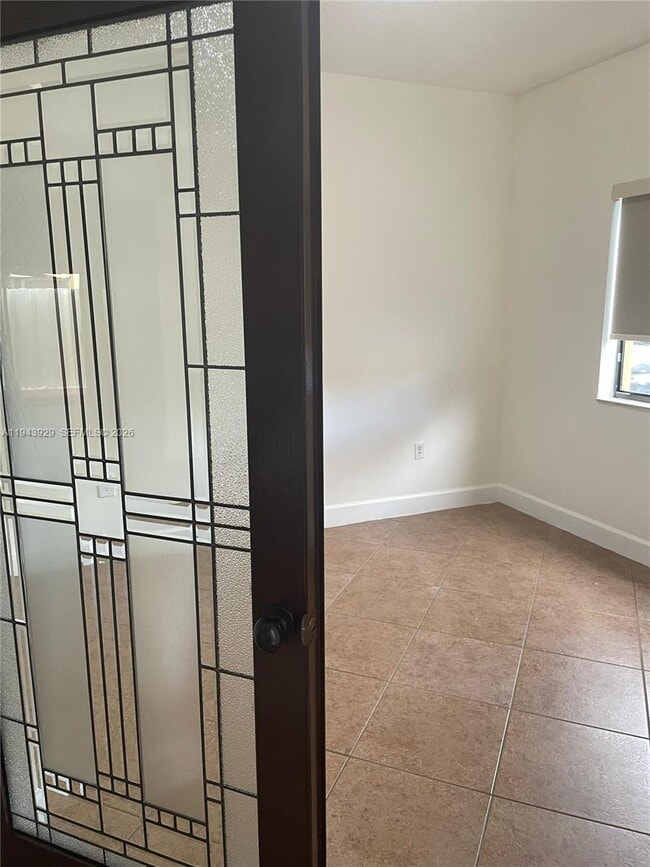 Building Photo - 11115 W Okeechobee Rd