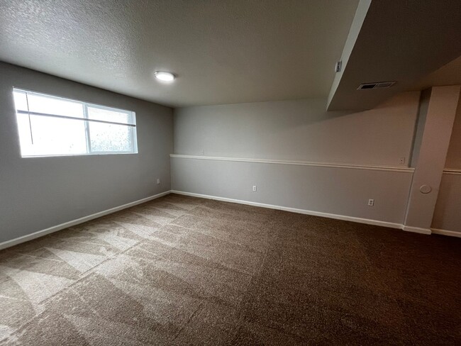 Building Photo - Welcome home to your updated 4-bedroom, 2 ...