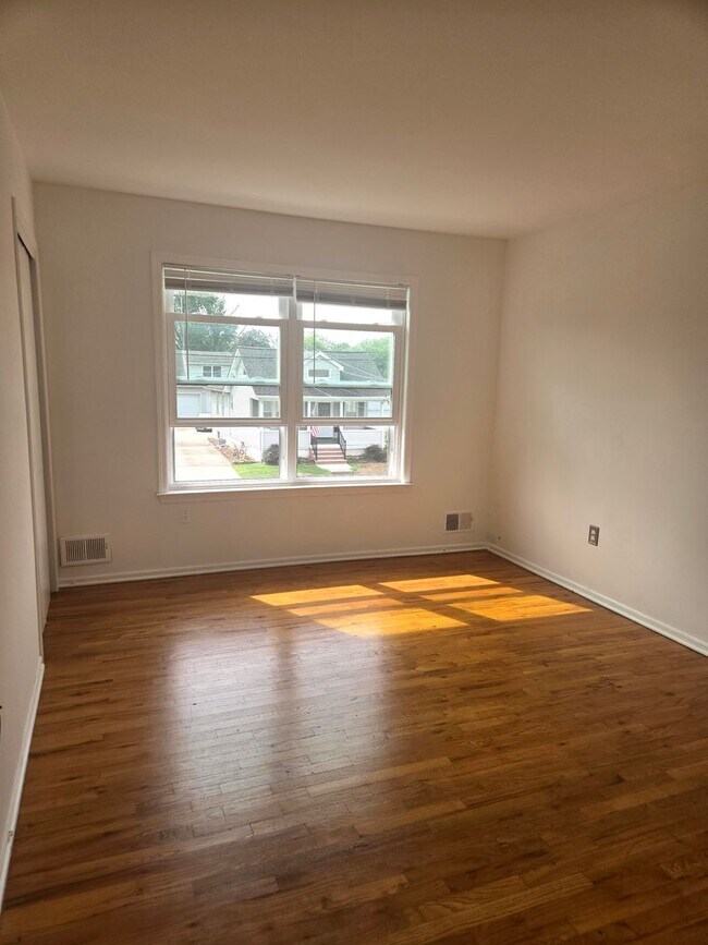 Building Photo - Updates abound at this SPACIOUS, half duplex with 3+ off-street parking spots, 3-bedrooms and 2 f...