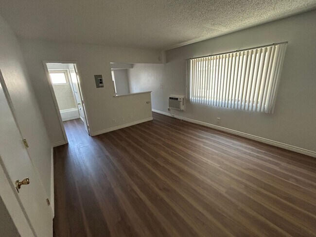 Building Photo - 1/2 OFF FIRST MONTH'S RENT studio with ALL UTILITIES PAID!