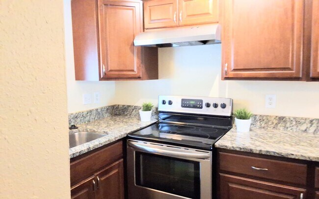 Building Photo - Stunning all remodeled 2/1.5 condo with Am...