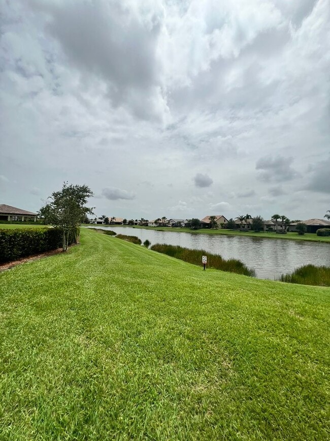 Building Photo - STUNNING LAKEFRONT 3 BEDROOM, 2.5 BATH HOM...
