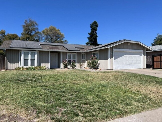 Primary Photo - Laminate flooring throughout. Solar panels...