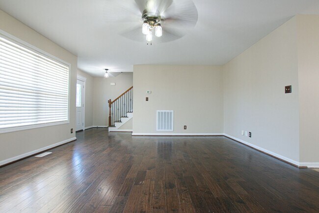 Building Photo - Pet Friendly Three Bedroom with Bonus!
