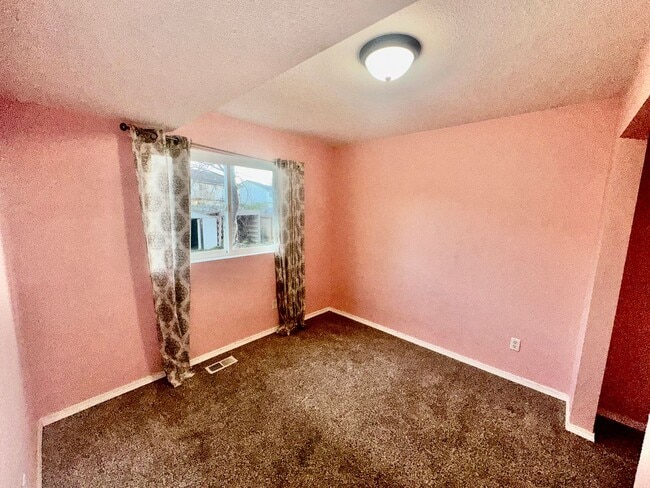 Building Photo - Check out the private fenced backyard!