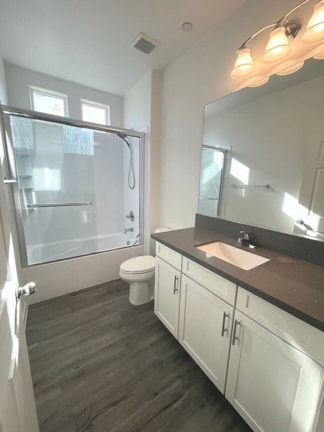 Building Photo - Single-story 1326 sq ft, townhome built in 2019 w/3 bed, 2 bath & spacious attached 2-car garage ...