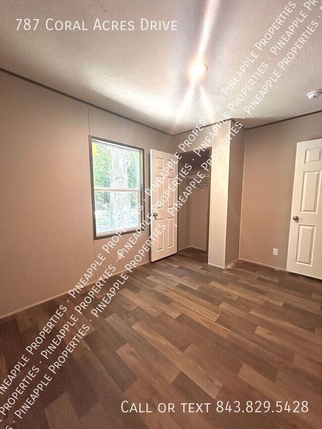 Building Photo - 787 Coral Acres Dr