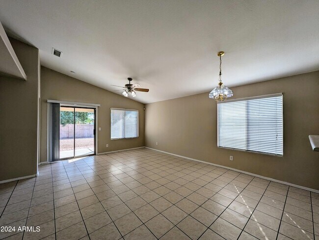 Building Photo - 7059 W Gardenia Ave