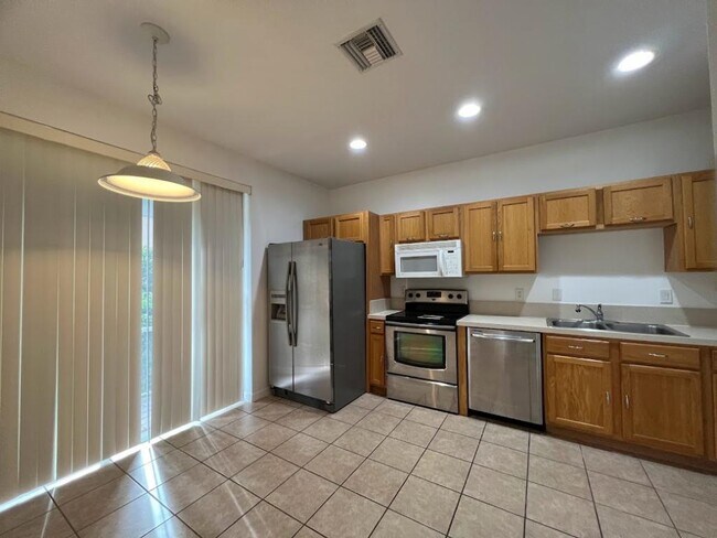 Building Photo - 9634 Roundstone Cir