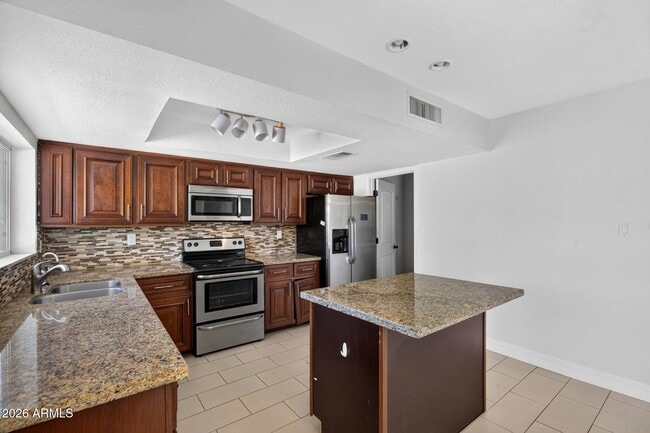 Building Photo - 8832 E Lupine Ave