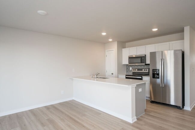 Building Photo - 1219 NE Crossing Oaks Dr
