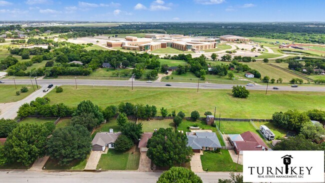 Building Photo - Cozy 3/2 Burleson Charmer | Wood-Burning Fireplace | 2-Car Garage | Pet-Friendly