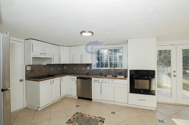 Building Photo - Move in before January 15th and choose your reward: a $250 Amazon Gift Card or a 55 Smart TV!