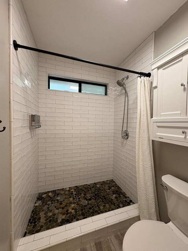 Building Photo - Your Private Escape – Charming Ranch-Style Home with Room to Breathe!