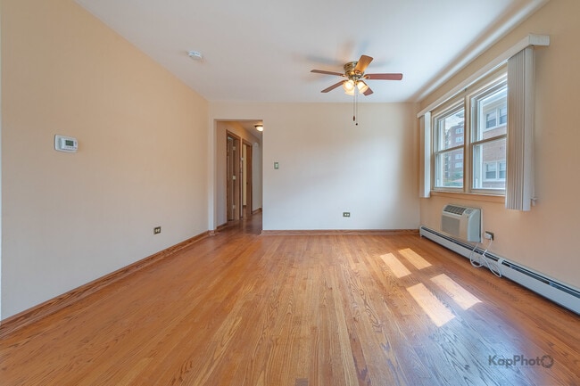 Building Photo - 8465 W Berwyn Ave