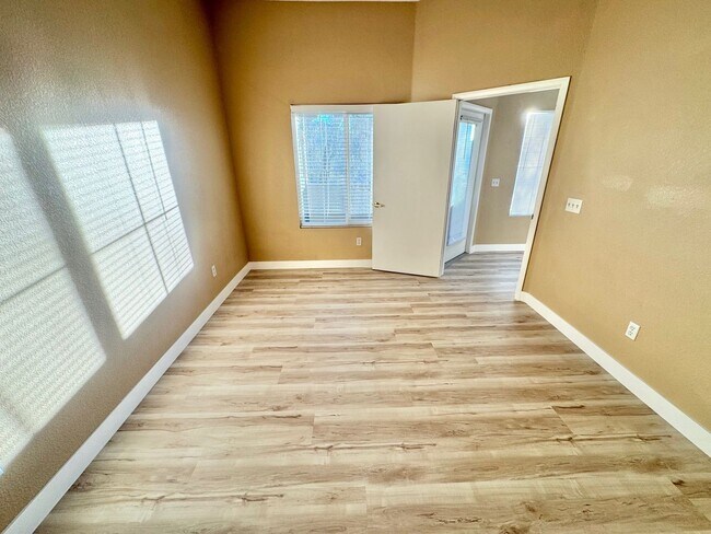 Building Photo - Welcoming 2 Bedroom home with private balcony located in South Las Vegas Community
