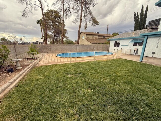 Building Photo - A Fabulous 4 Bedroom Home in Highland Hills