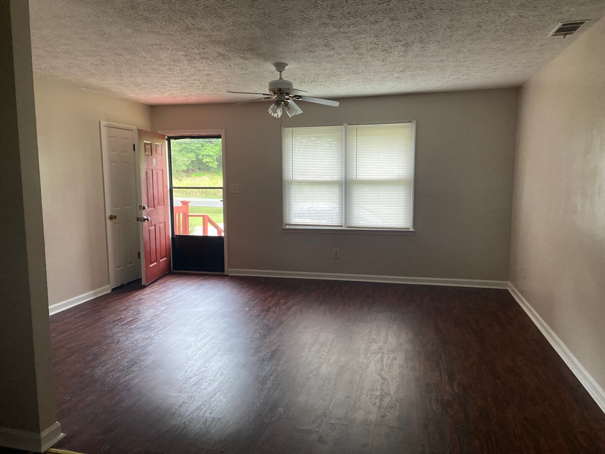 Great room, coat closet. - 613 Chulio Rd SE