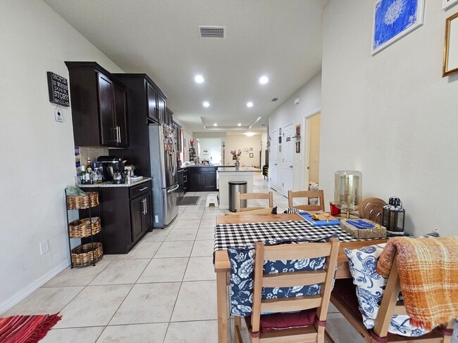 Building Photo - Beautiful 3-Bedroom + Flex Space in gated ...