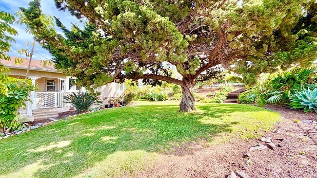 Building Photo - Beautiful Craftsman-style Home with fenced yard space, detached garage and additional parking in ...