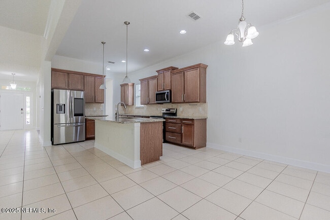 Building Photo - 4599 Plantation Oaks Blvd