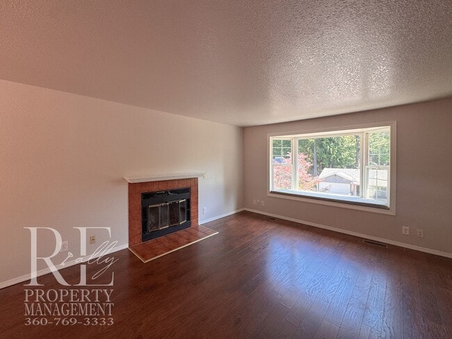Building Photo - Freshly Painted East Bremerton Home with Expansive Decks & Flexible Living Space