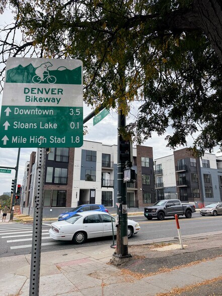 Building amenities include racks for snowboards and bikes. - 1650 Sheridan Blvd